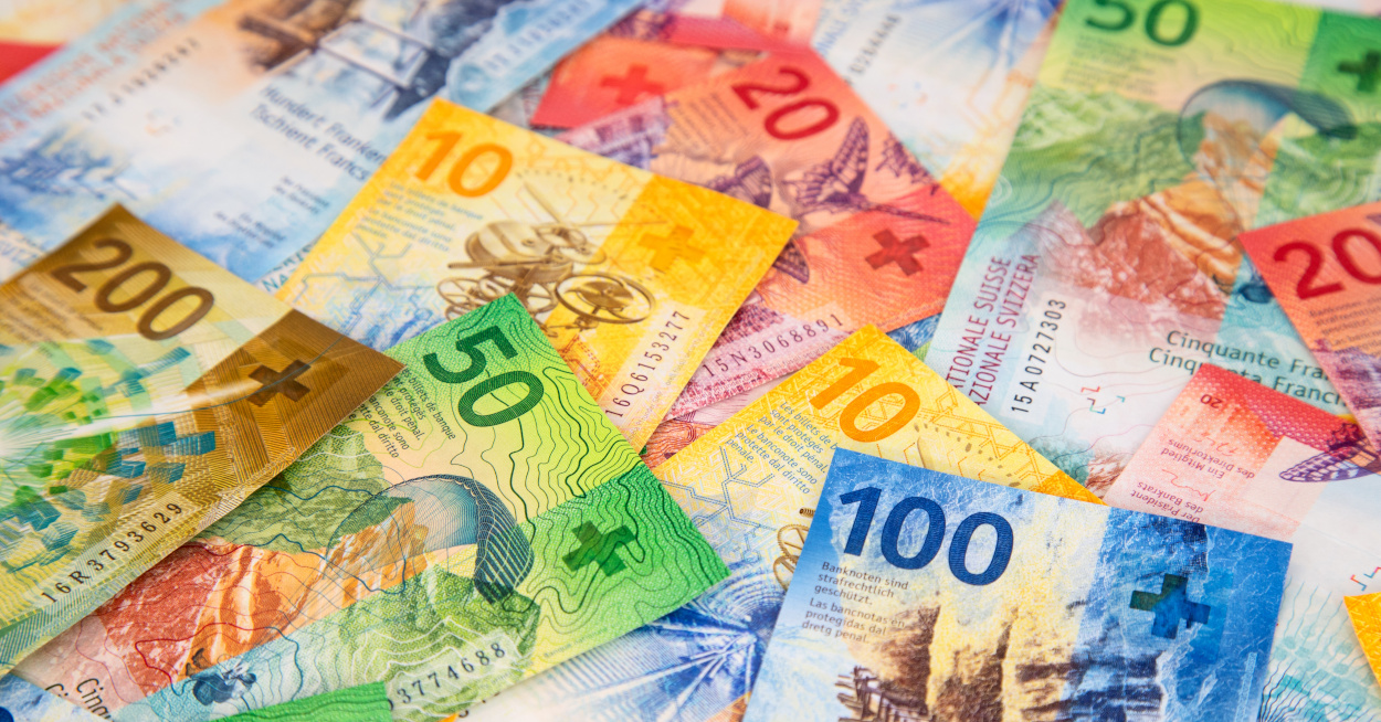 Switzerland banknotes in disarray.